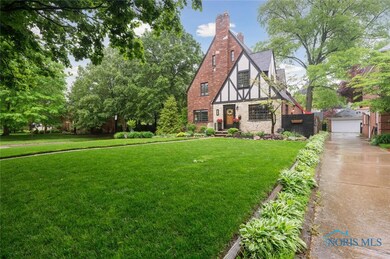 2.5 story, 4 bedroom with a 3 car garage and a fin