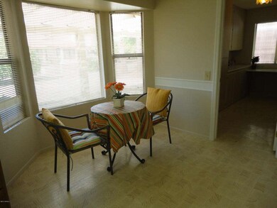 Cozy dining area with bay window