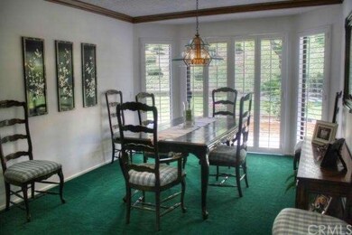 Formal Dining room / Custom wood shutters