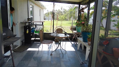 Back patio with nice tile flooring.