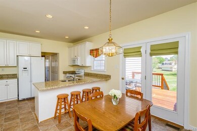 Eat-In Kitchen with Breakfast Bar offers plenty of