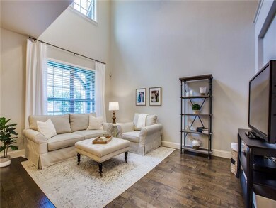 Soaring ceiling allows light in from both levels