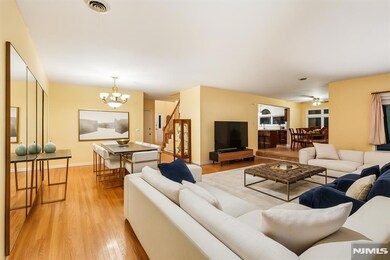 Living RoomThe dining room flows seamlessly into the spacious living room offering an open concept layout.