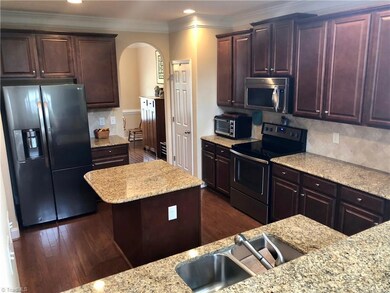 Kitchen Island, hardwoods, beautiful cabinets