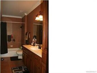Spare bathroom steel tub with tile surround and li