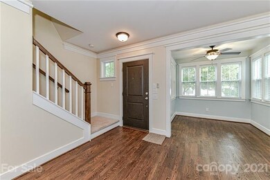 Beatiful hardwood floors and crafstman details wit