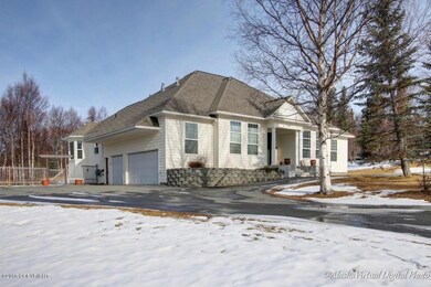 Front View & Three Car Garage