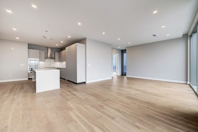 This spacious, modern living area features an open