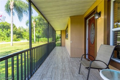 Nice Tiled-Screened Front Porch