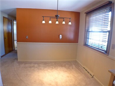 dining room open to kitchen and living room , hard