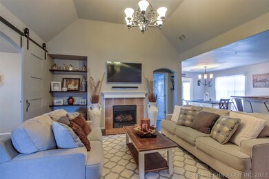 The barn doors and beautiful shelves offer great m