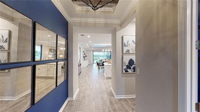 * REPRESENTATIVE PHOTO. A cozy foyer to make you feel right at home.