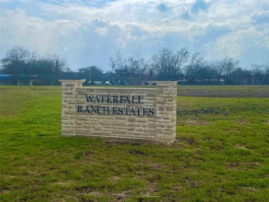 Community sign with a lawn