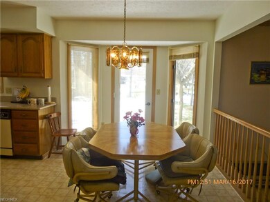 A dinette for small family meals with glass door a