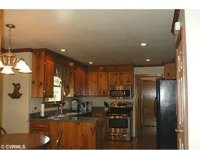 Kitchen - Spacious with eating area! Dining room a
