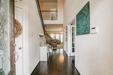 The welcoming, two story entry with hardwood flooring is your first introduction to the interior of this lovingly maintained family home.