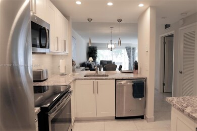 470 Paradise Isle Blvd unit 107, Hallandale Beach, FL 33009 - photo 3