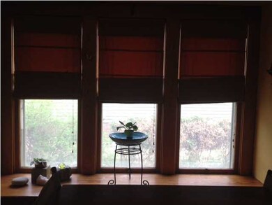 The large dining window features a nice window sea