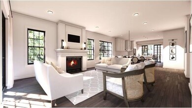 Living Room area with gas insert fireplace.