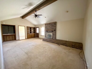 1st living room with large fireplace