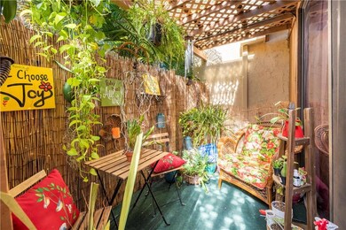 This little garden alcove greets you by the front