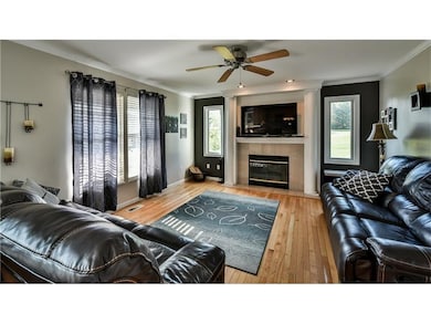 COZY FAMILY ROOM WITH GAS FIREPLACE AND BEAUTIFUL 