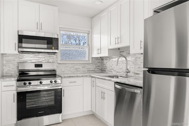 345 41st St, Copiague, NY 11726 - photo 2