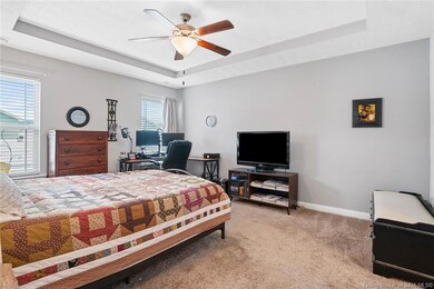 Primary Bedroom with tray ceiling