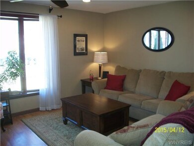 Living Room. Bright sunny living room overlooking 