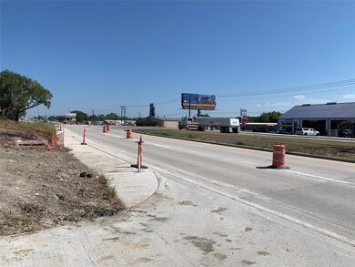 Street view facing north from property entrance.