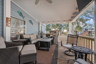 Deck with a ceiling fan and an outdoor hangout are
