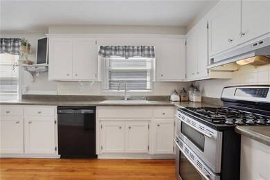 The kitchen is spacious, and again features beauti