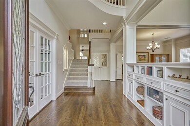 Note the endless moldings and added details like etched glass in the pass through doors.
