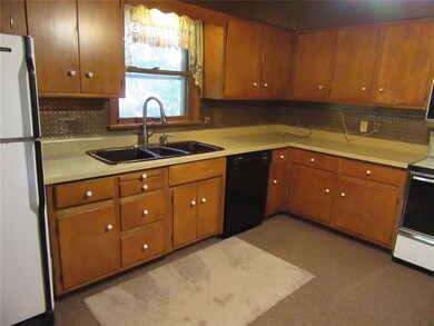 Plenty of counter space & cabinets in the spacious