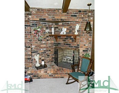 Den/Family/Great Room. Cozy Brick Gas Burning Fire