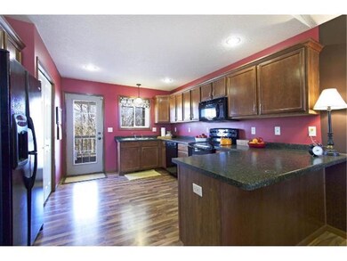 A bright and cheery kitchen that you can walk out 