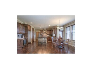 Simulated Photo. Kitchen w/ island, granite, walk-