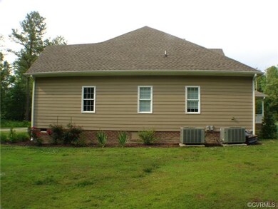 Right side of house duel heat pumps.
