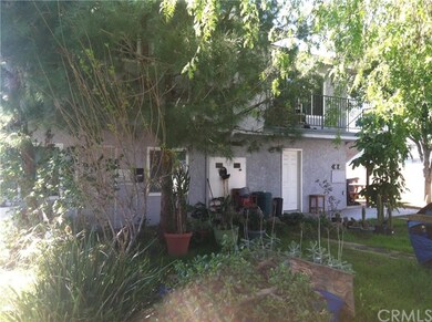 Back, 2-unit building looking from shared yard bet