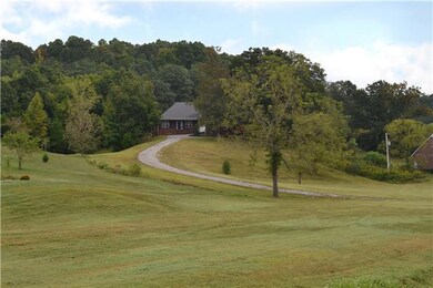 Perched on a knoll overlooking gorgeous foothills this 2584 SF home boasts an open floorplan, split bedrroom design & a number of architectural features that include a dbl trey ceiling, Palladian window, hrdwds, tiled baths, 10' ceilings & more!