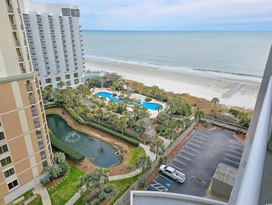Bird's eye view with a water view and a view of th