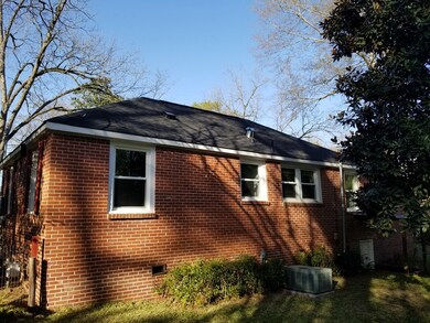 Back view w/ new roof 3/26/2022