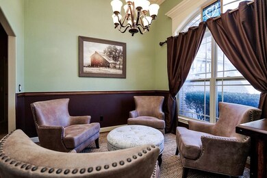Formal Dining Room with large window and wood acce