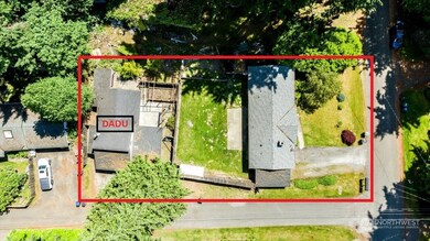 Main front house on right. DADU in back part of property on the left.