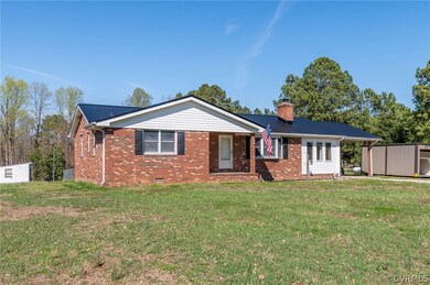 Single story home with a storage shed and a front