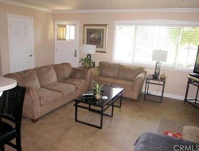 Spacious living room with oversized ceramic tile f