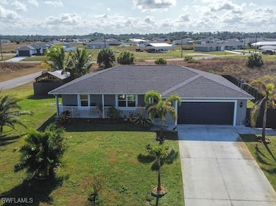 View of front of property with an attached garage,