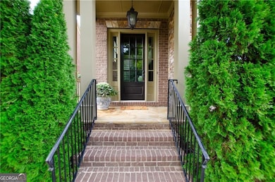 Property entrance with brick siding