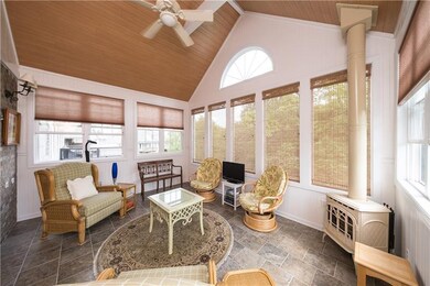 Here is The 4 Season Room! With A Fire Place So Re