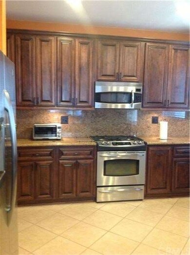 Beautifully remodeled with custom cabinets & upgra